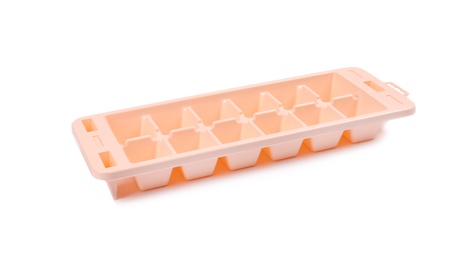 Photo of Empty ice cube tray on white background