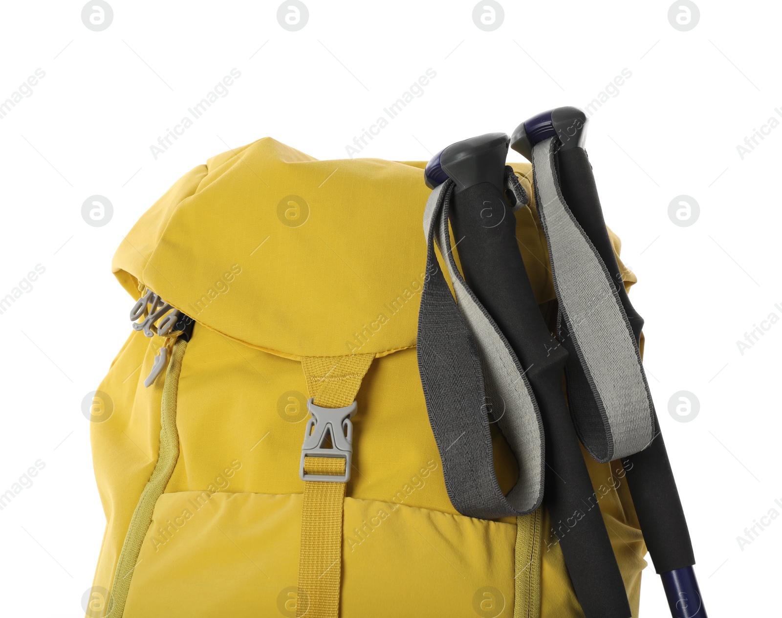 Photo of Trekking poles and yellow backpack on white background