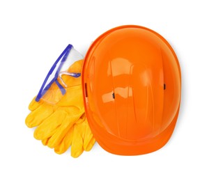 Hard hat, goggles and gloves isolated on white, top view. Safety equipment