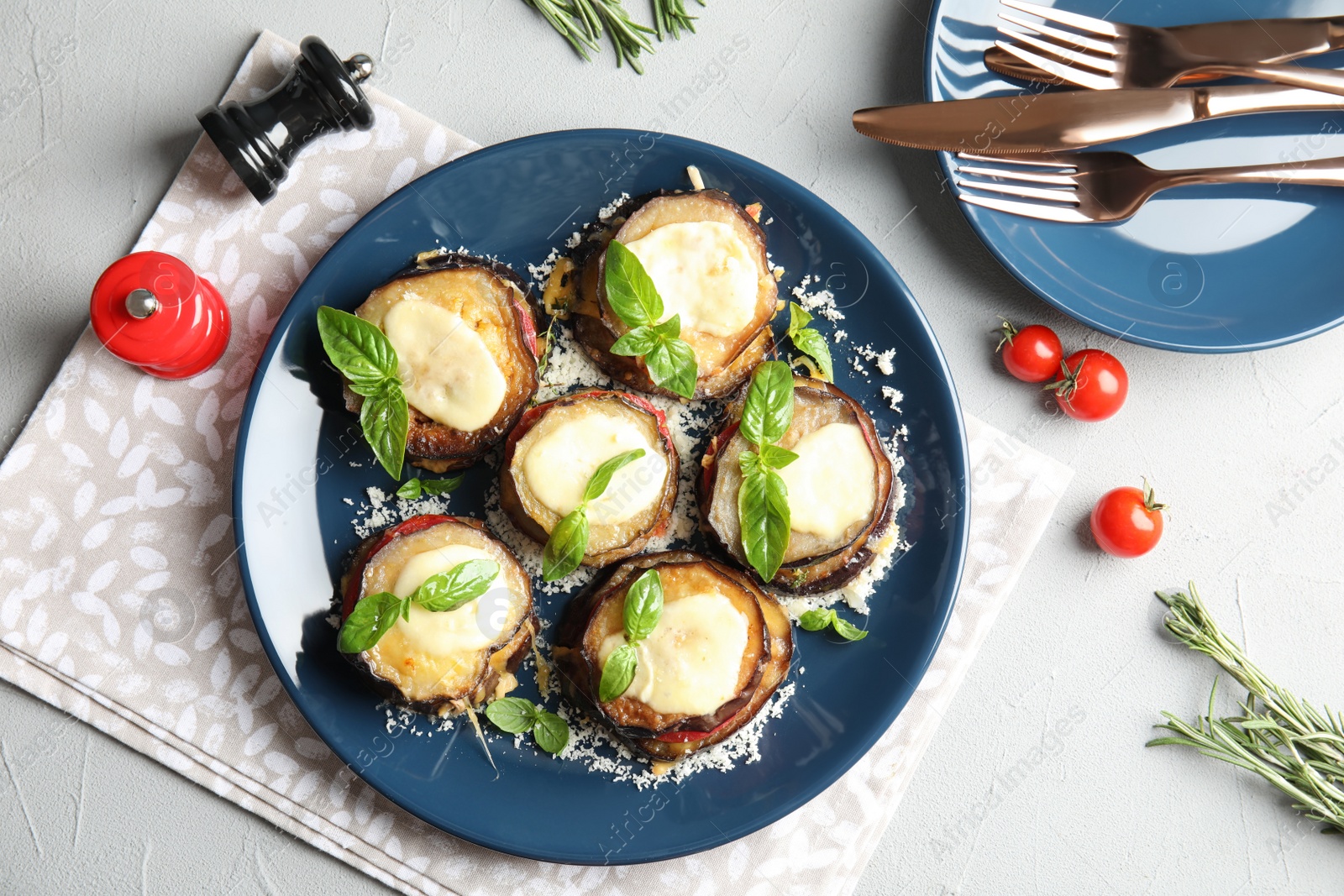 Photo of Flat lay composition with baked eggplant, tomatoes and cheese served on table