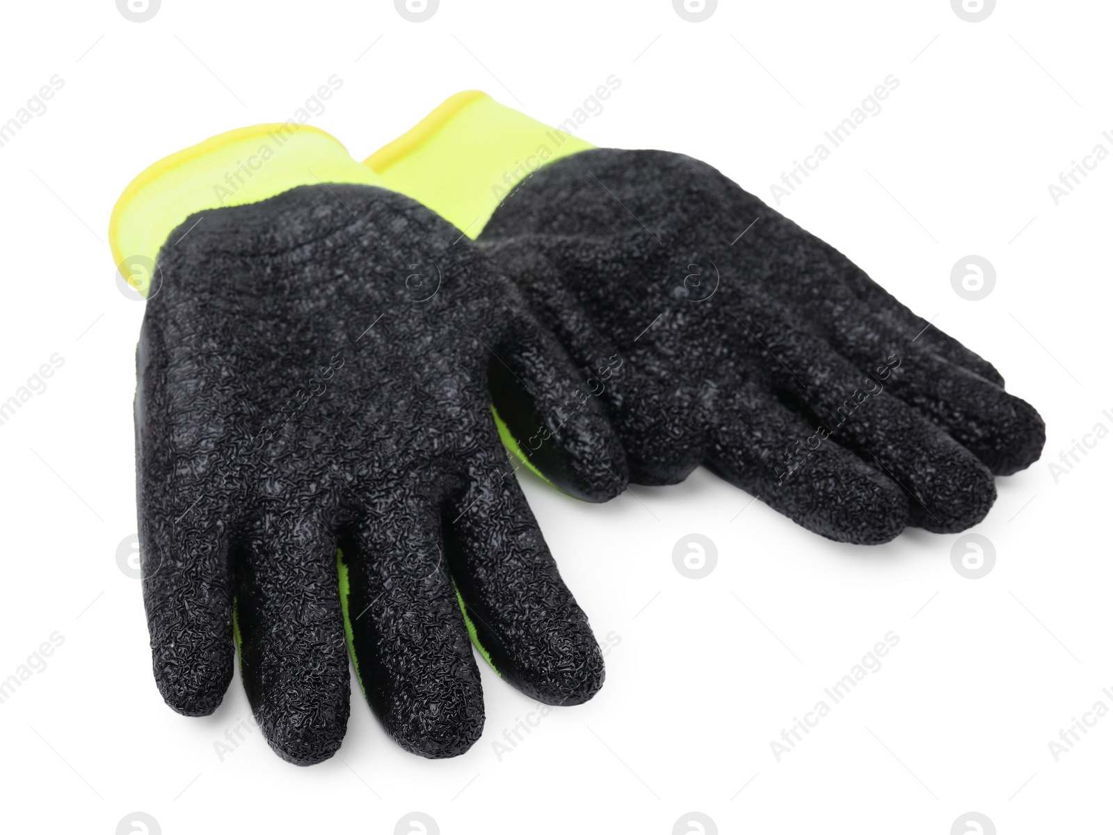 Photo of Pair of color gardening gloves isolated on white