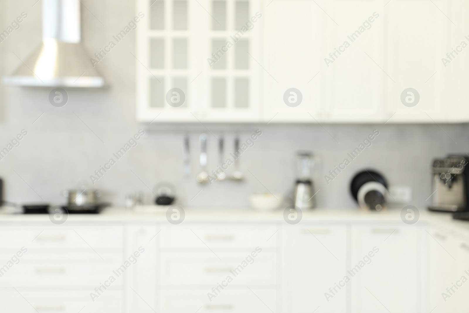 Photo of Blurred view of modern kitchen. Interior design