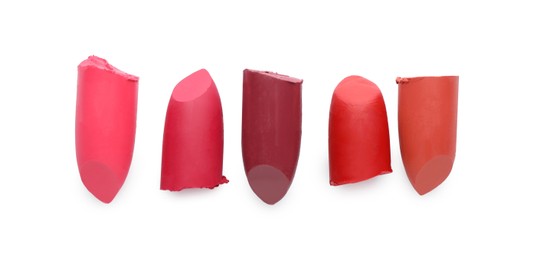 Photo of Different beautiful lipsticks on white background, top view