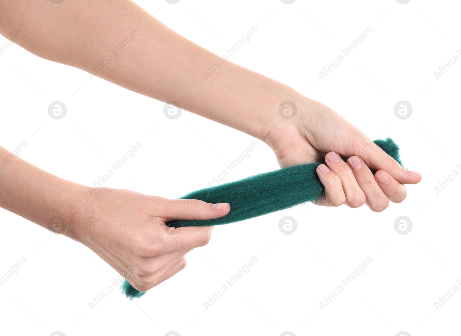 Photo of Woman holding teal felting wool on white background, closeup