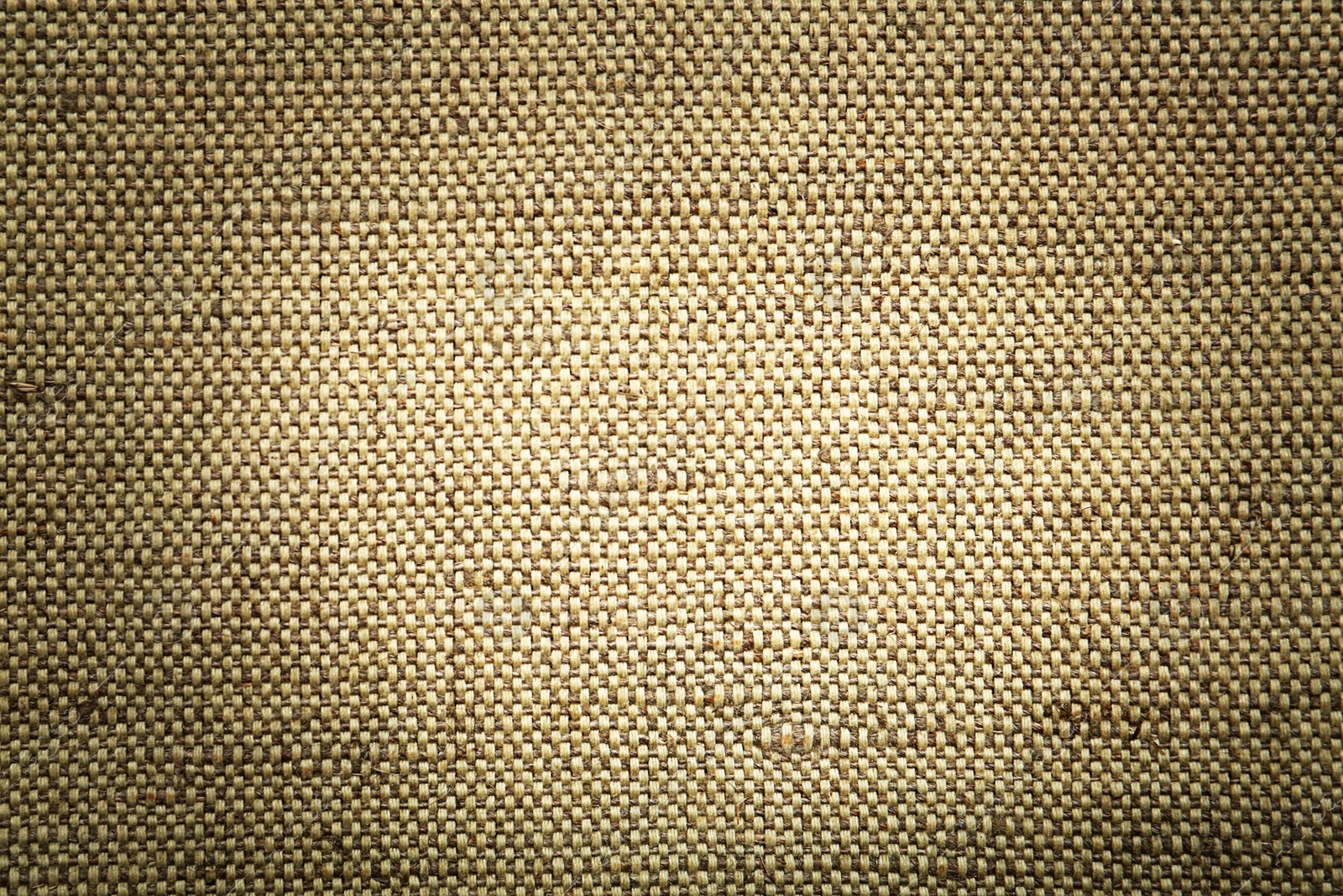 Image of Texture of natural burlap fabric as background, top view. Vignette effect 