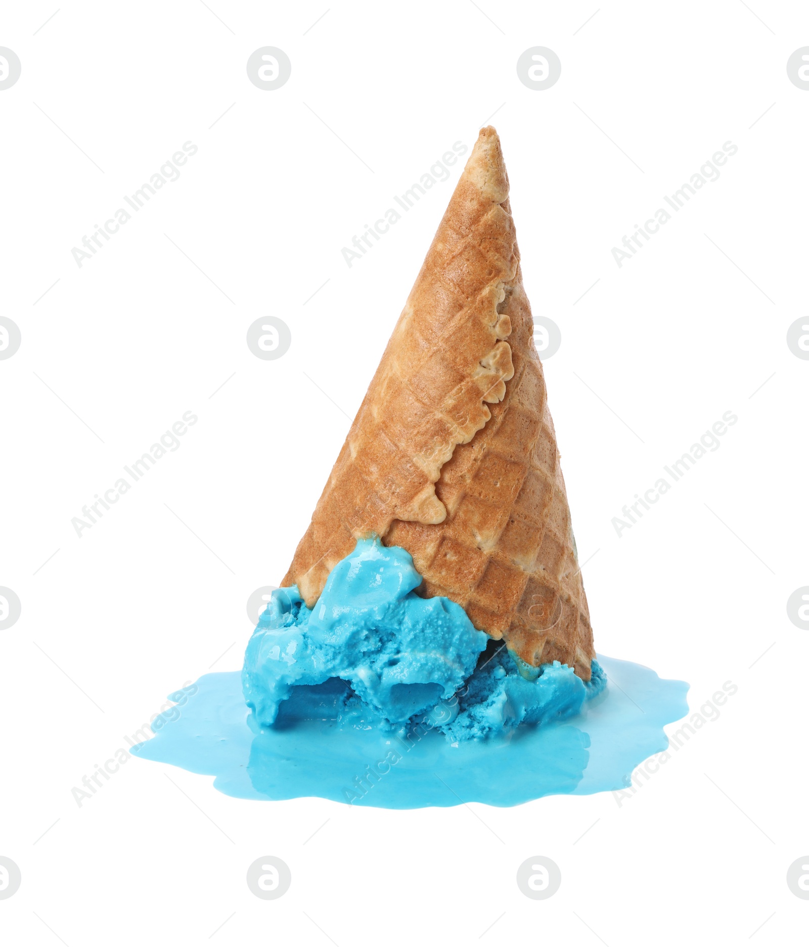 Photo of Melting ice cream in wafer cone isolated on white