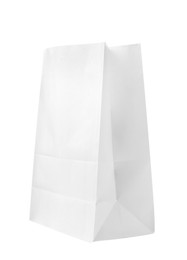 Photo of New open paper bag isolated on white