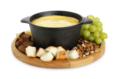 Fondue with tasty melted cheese and different products isolated on white