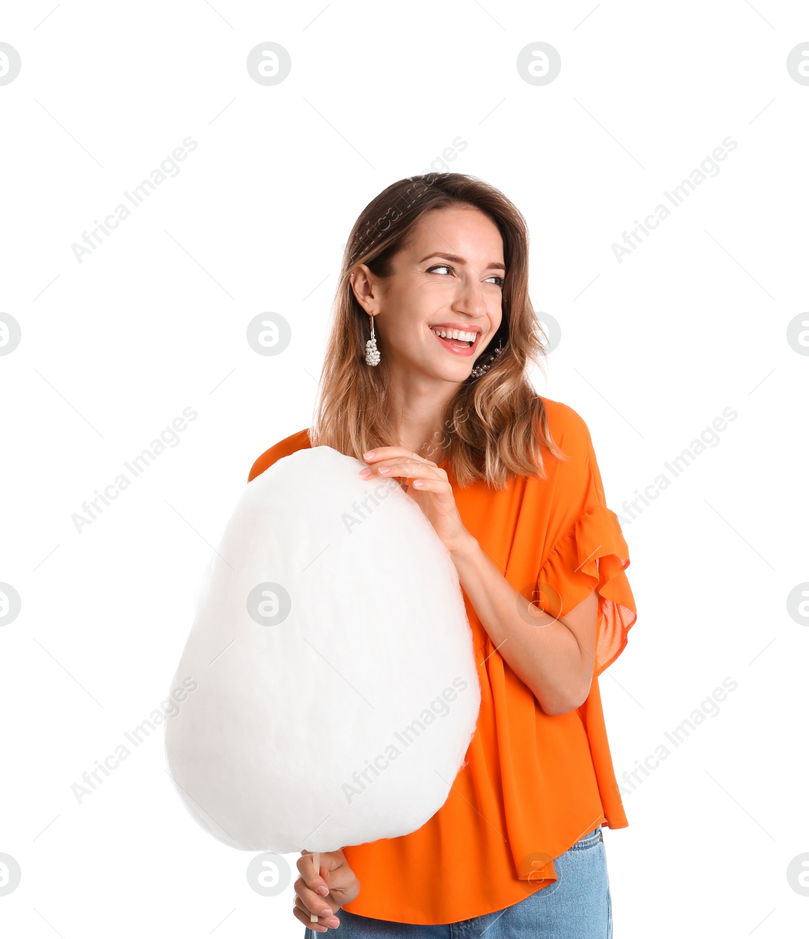 Photo of Happy young woman with cotton candy on white background