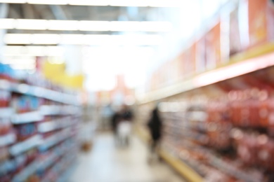 Blurred view of modern supermarket interior