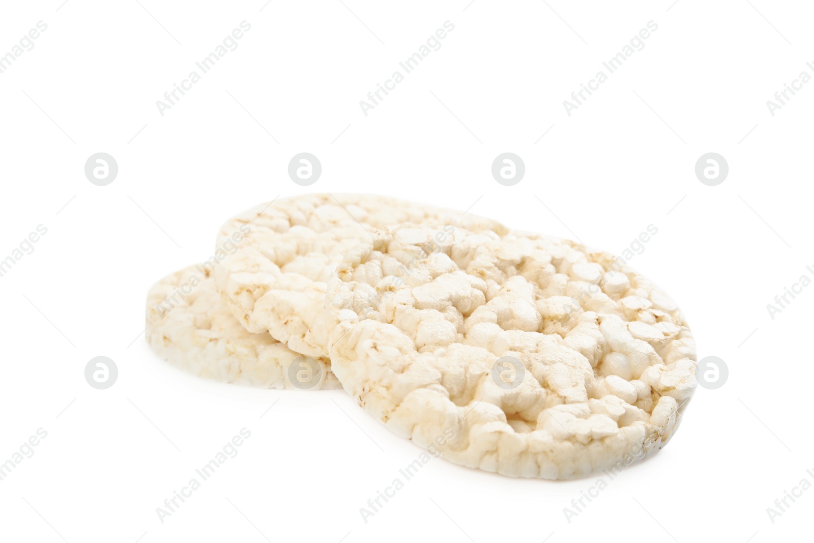 Photo of Puffed rice cakes isolated on white. Healthy snack