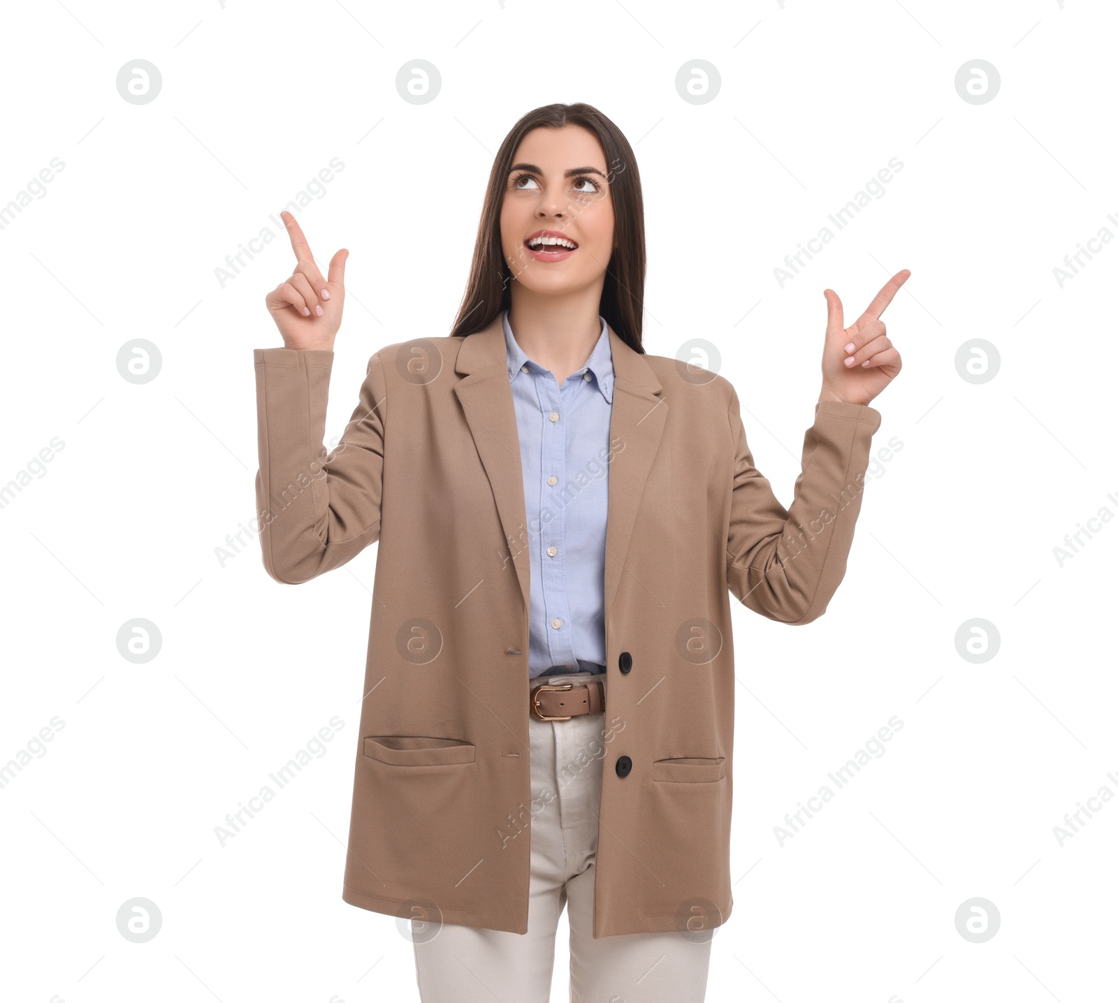 Photo of Beautiful businesswoman pointing at something on white background