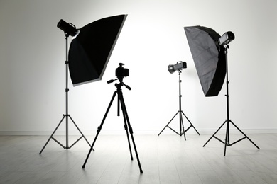 Interior of modern photo studio with professional equipment