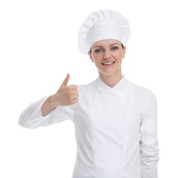 Happy woman chef in uniform showing thumbs up on white background