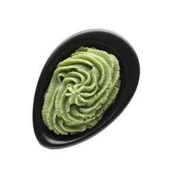 Photo of Bowl with swirl of wasabi paste isolated on white, top view