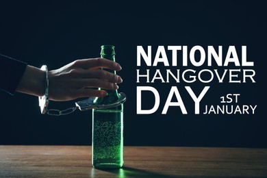 Image of National hangover day - January 1st. Woman handcuffed to bottle of beer against black background, closeup