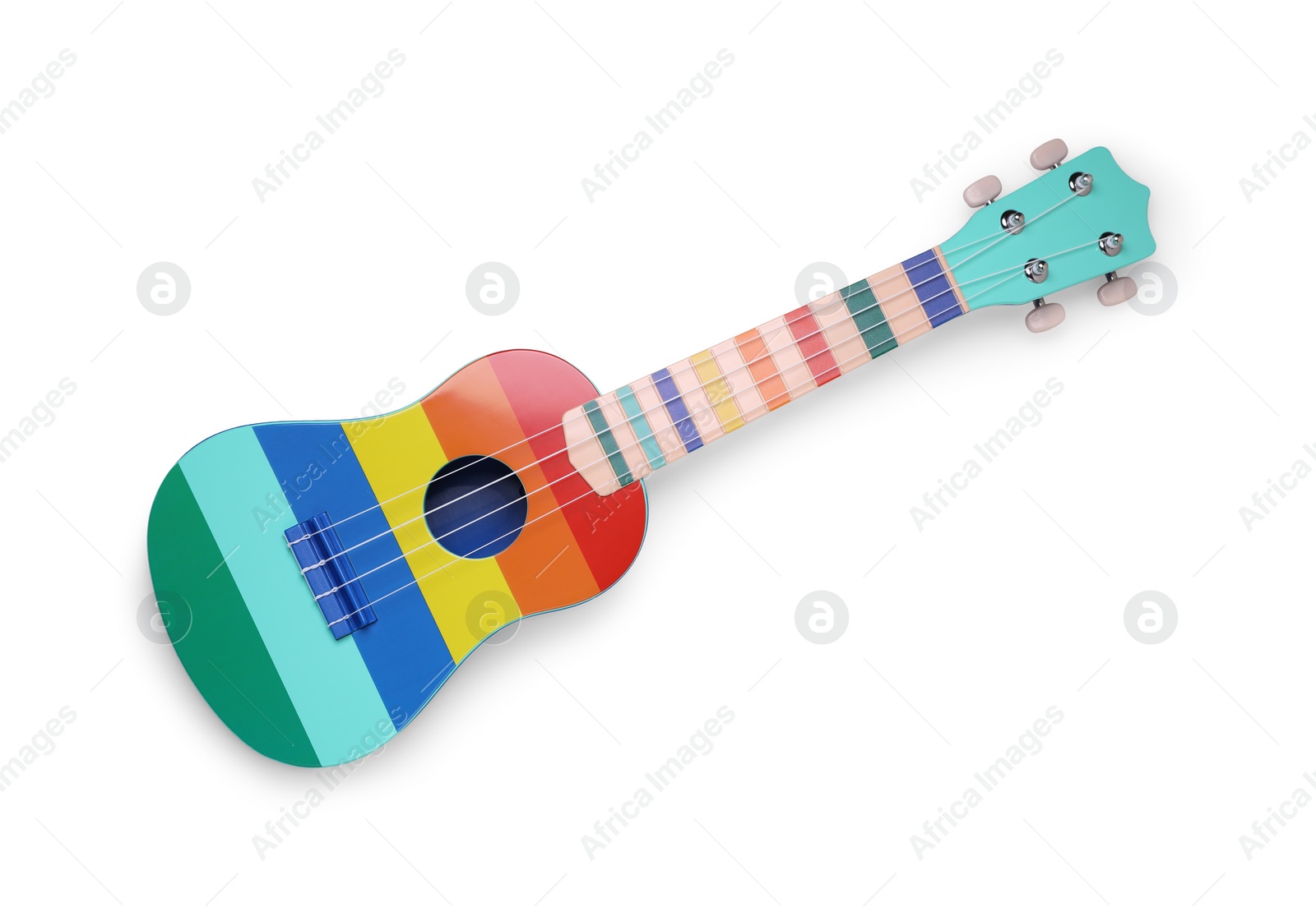 Photo of Colorful ukulele on white background, top view. String musical instrument