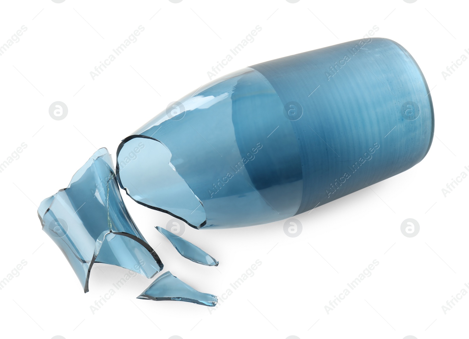 Photo of Broken blue glass vase isolated on white