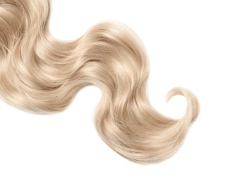 Lock of blonde wavy hair on white background, top view