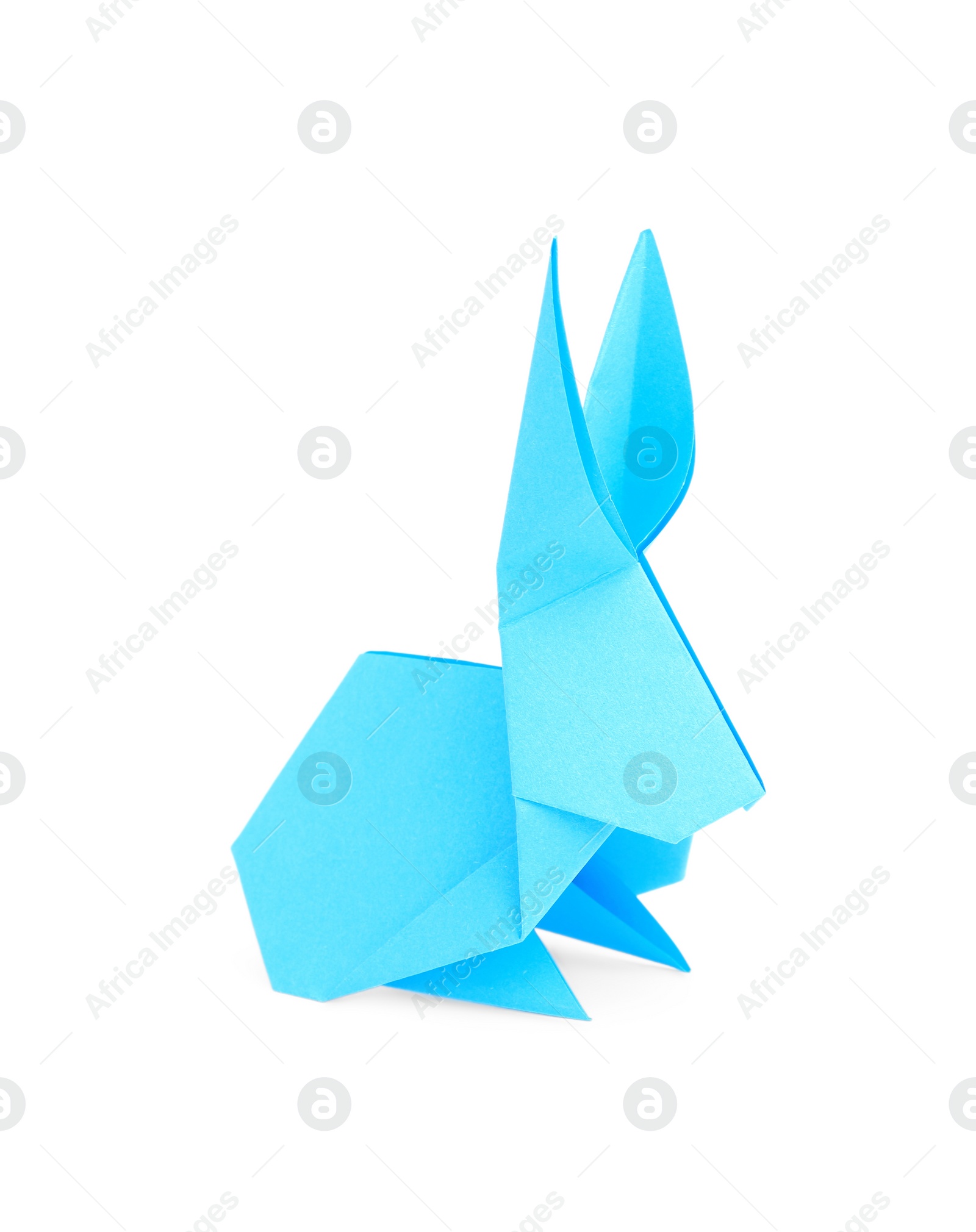 Photo of Light blue paper bunny isolated on white. Origami art