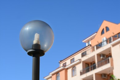 Photo of Beautiful street lamp outdoors on sunny day, space for text