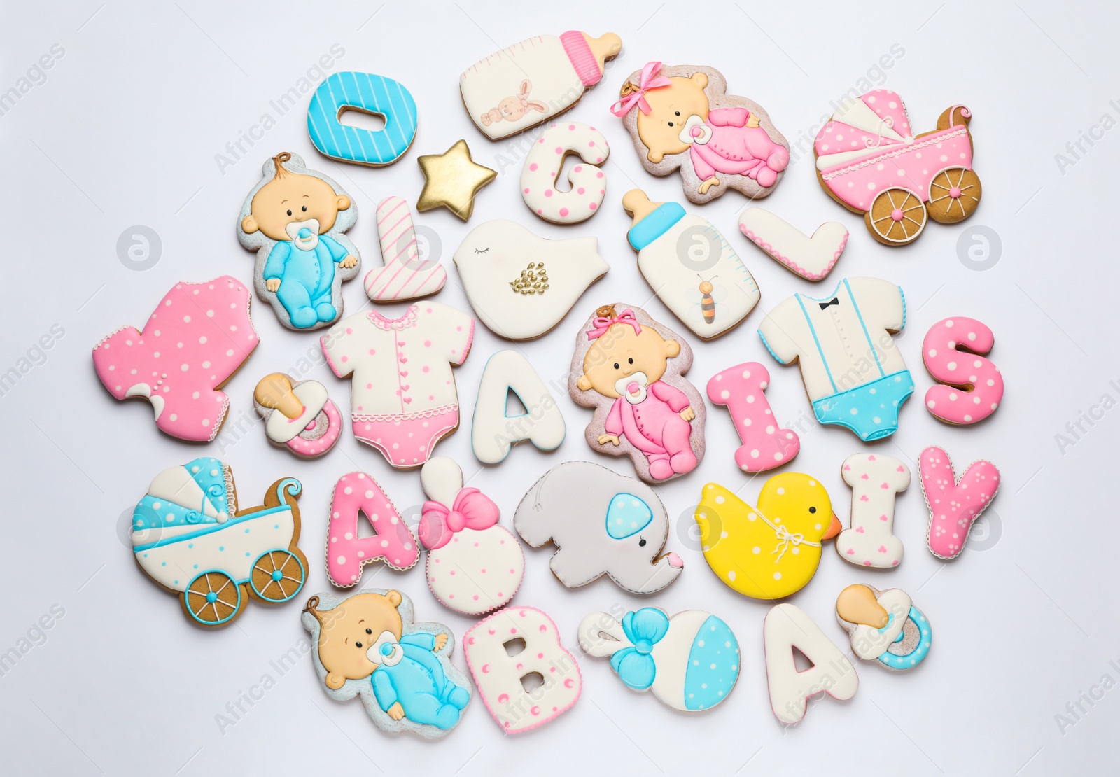 Photo of Set of baby shower cookies on light background, flat lay