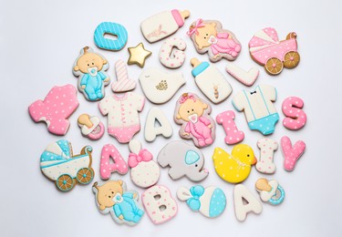 Set of baby shower cookies on light background, flat lay