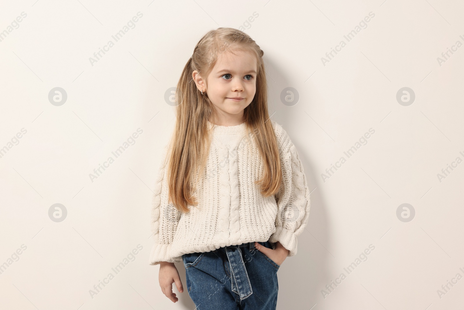 Photo of Fashion concept. Stylish girl posing on white background