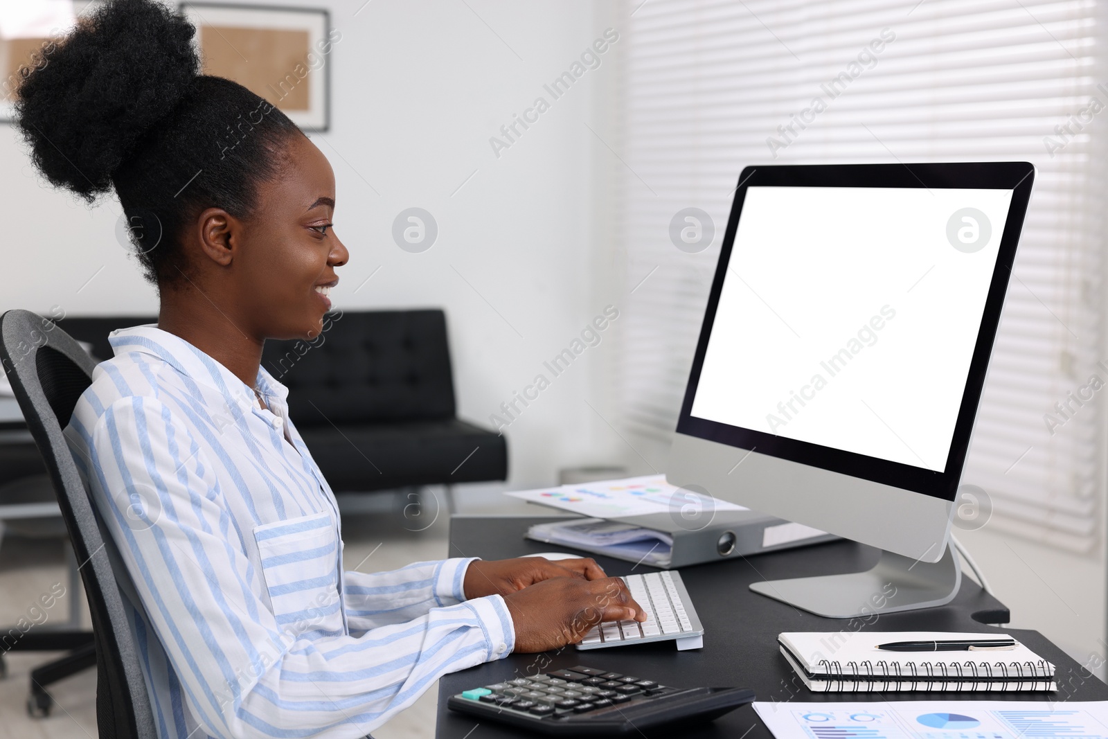 Photo of Professional accountant working on computer at desk in office
