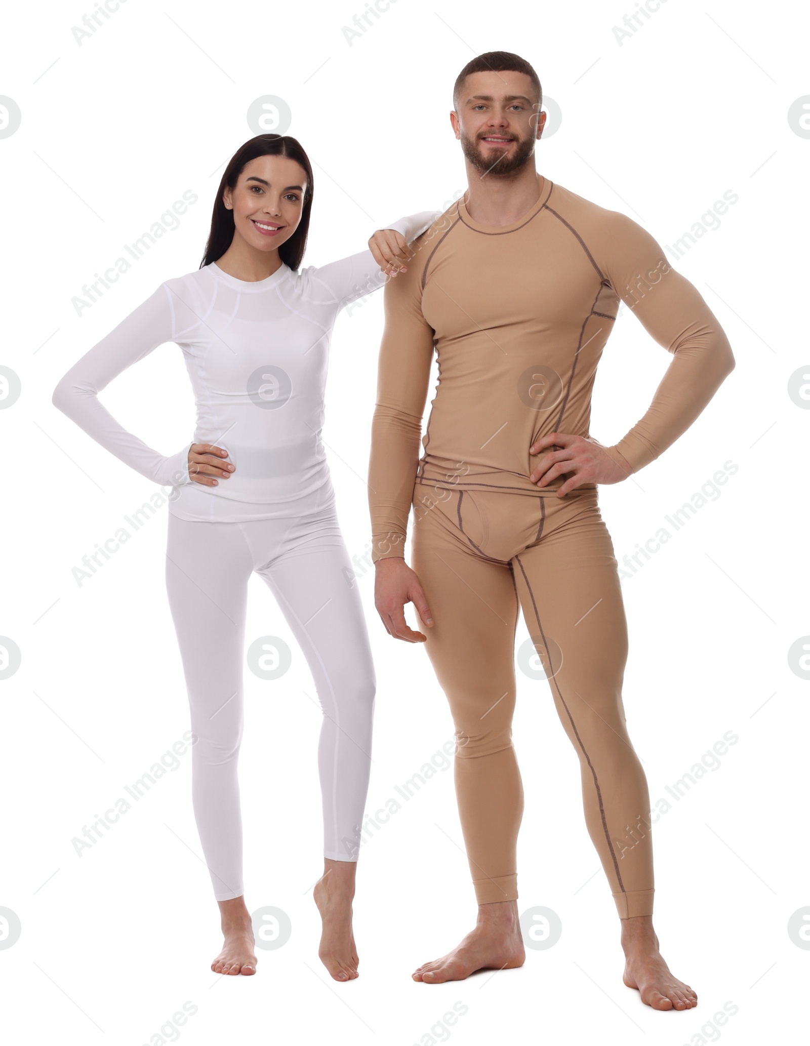 Photo of Man and woman in warm thermal underwear on white background