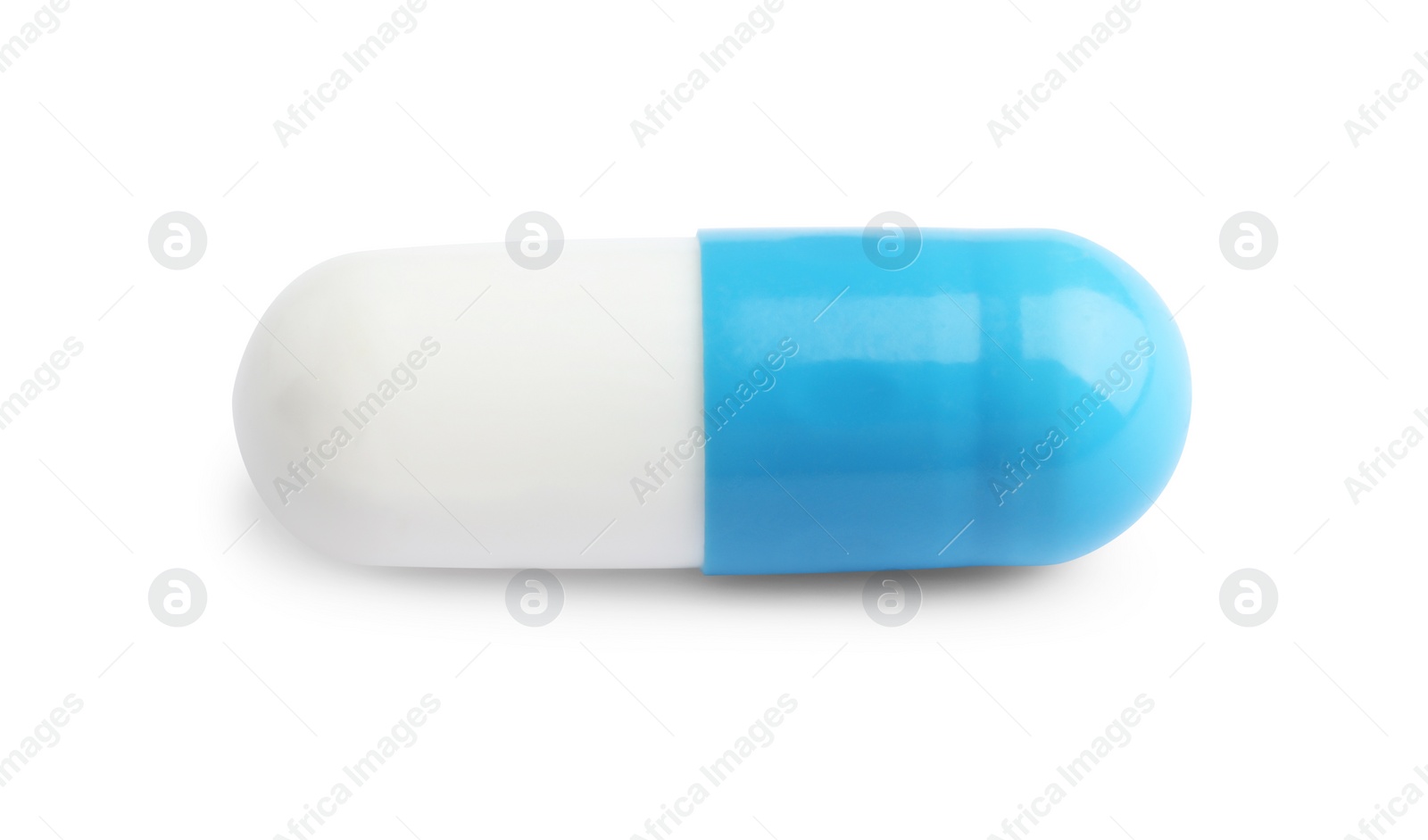 Photo of One pill isolated on white. Drug therapy