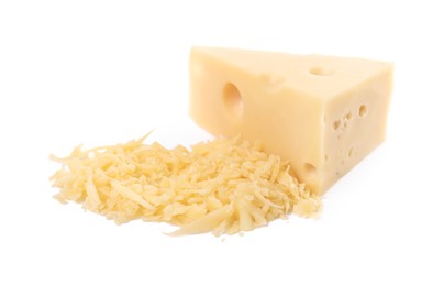 Photo of Grated and whole piece of cheese isolated on white