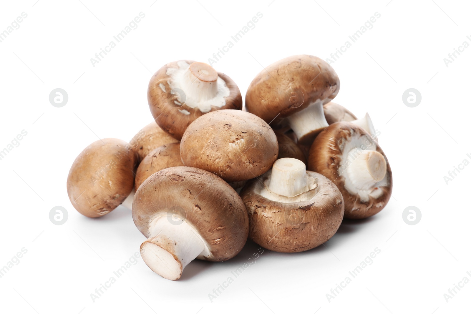 Photo of Fresh champignon mushrooms isolated on white. Healthy food