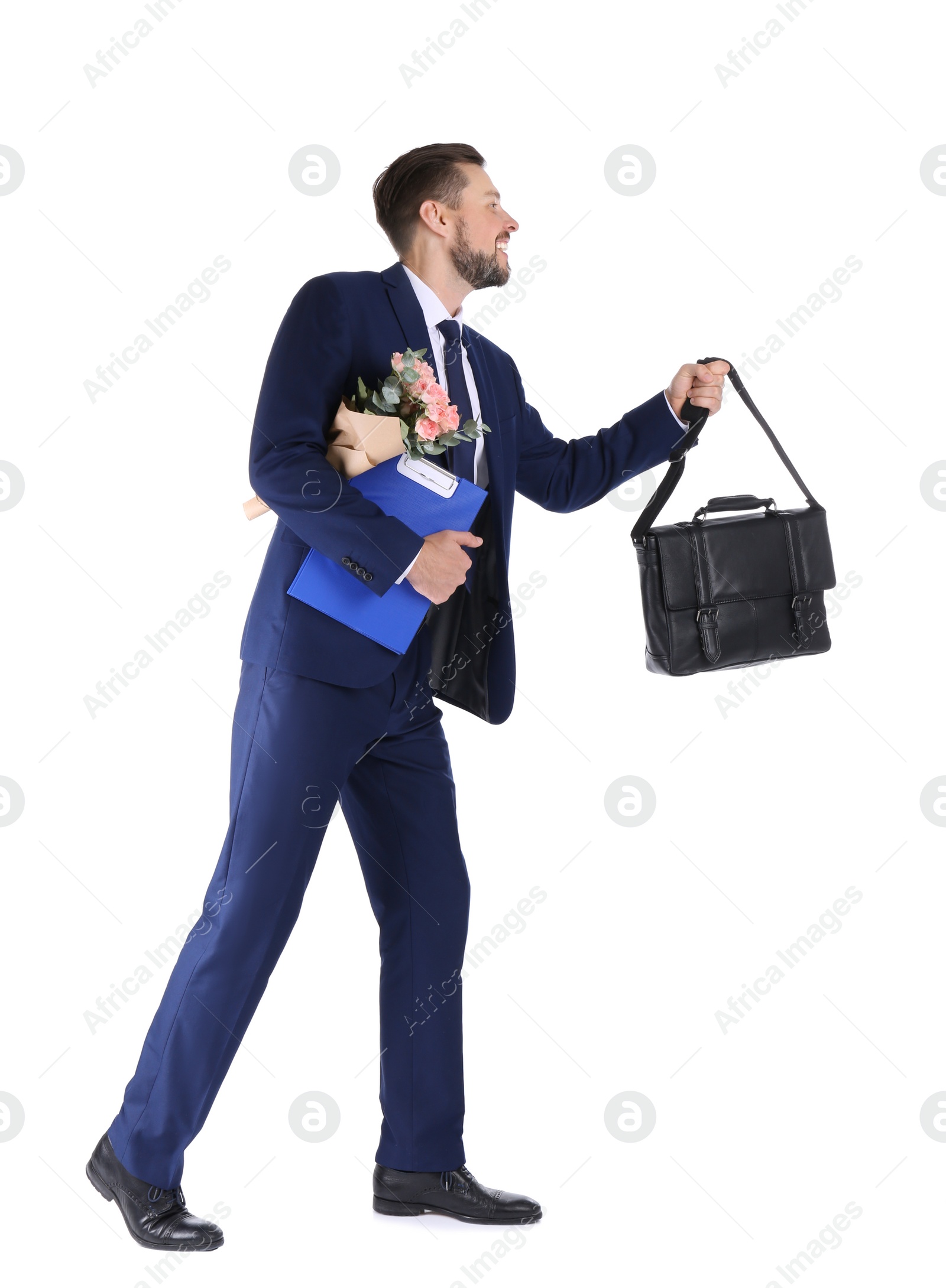 Photo of Businessman with briefcase, clipboard and flowers walking on white background. Combining life and work