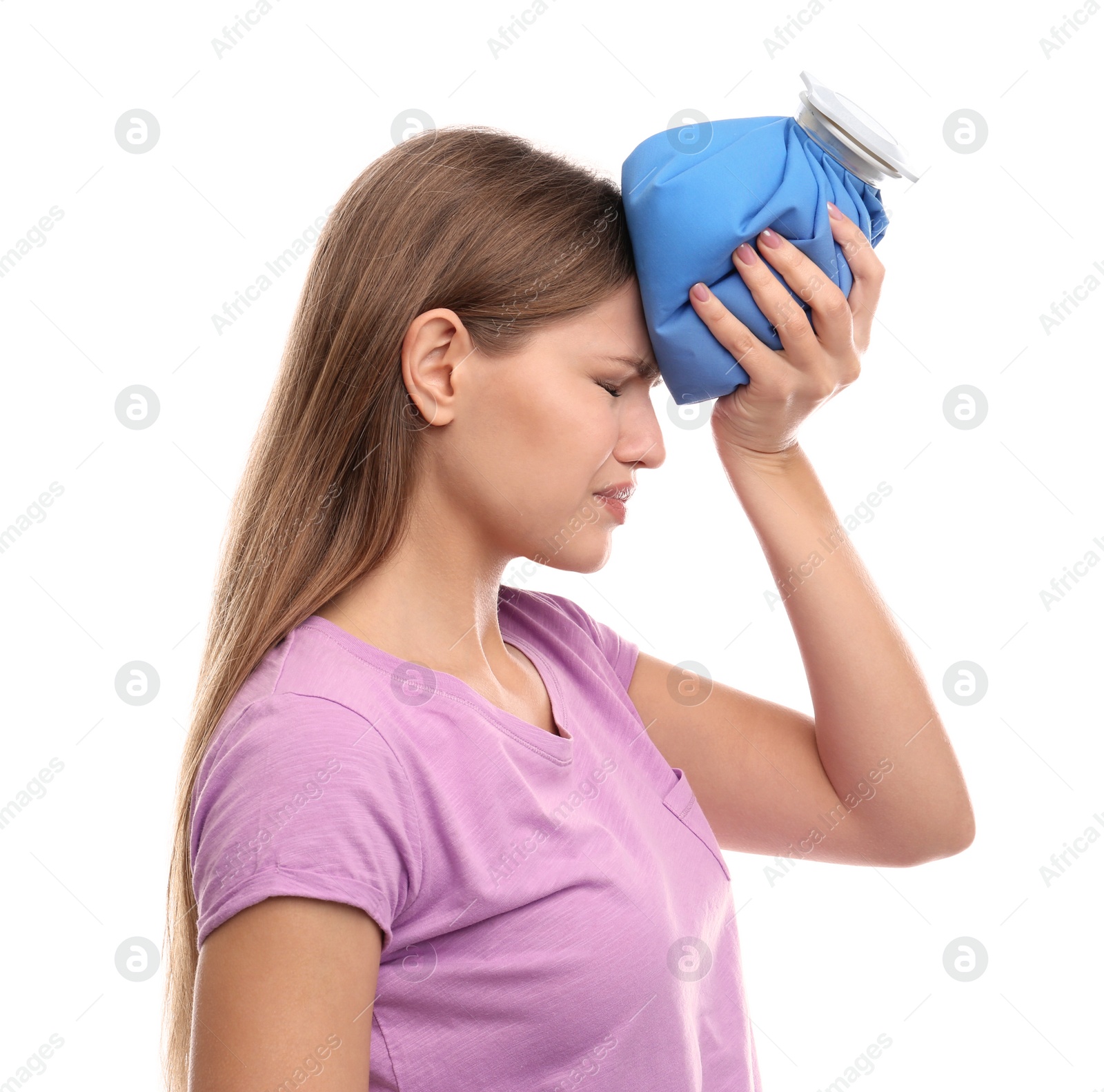 Photo of Unhappy woman using cold pack to cure headache on white background