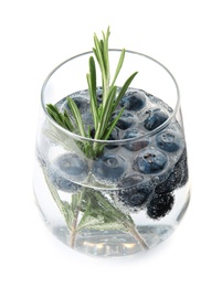 Photo of Glass of refreshing blueberry cocktail with rosemary on white background