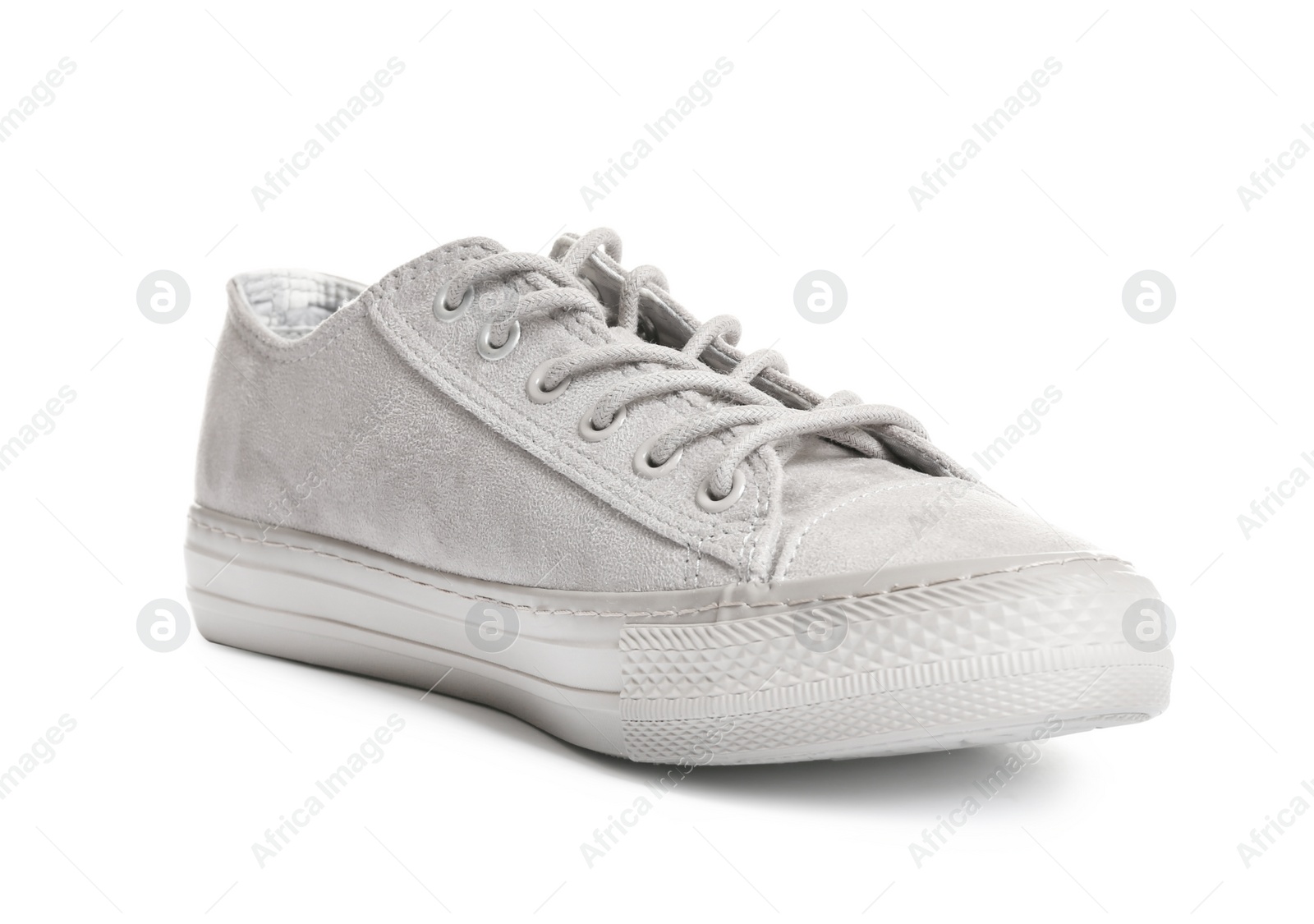 Photo of Stylish sneaker on white background. Trendy footwear