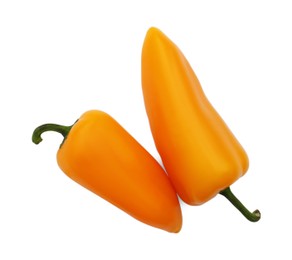 Photo of Fresh raw orange hot chili peppers on white background, top view. Space for text