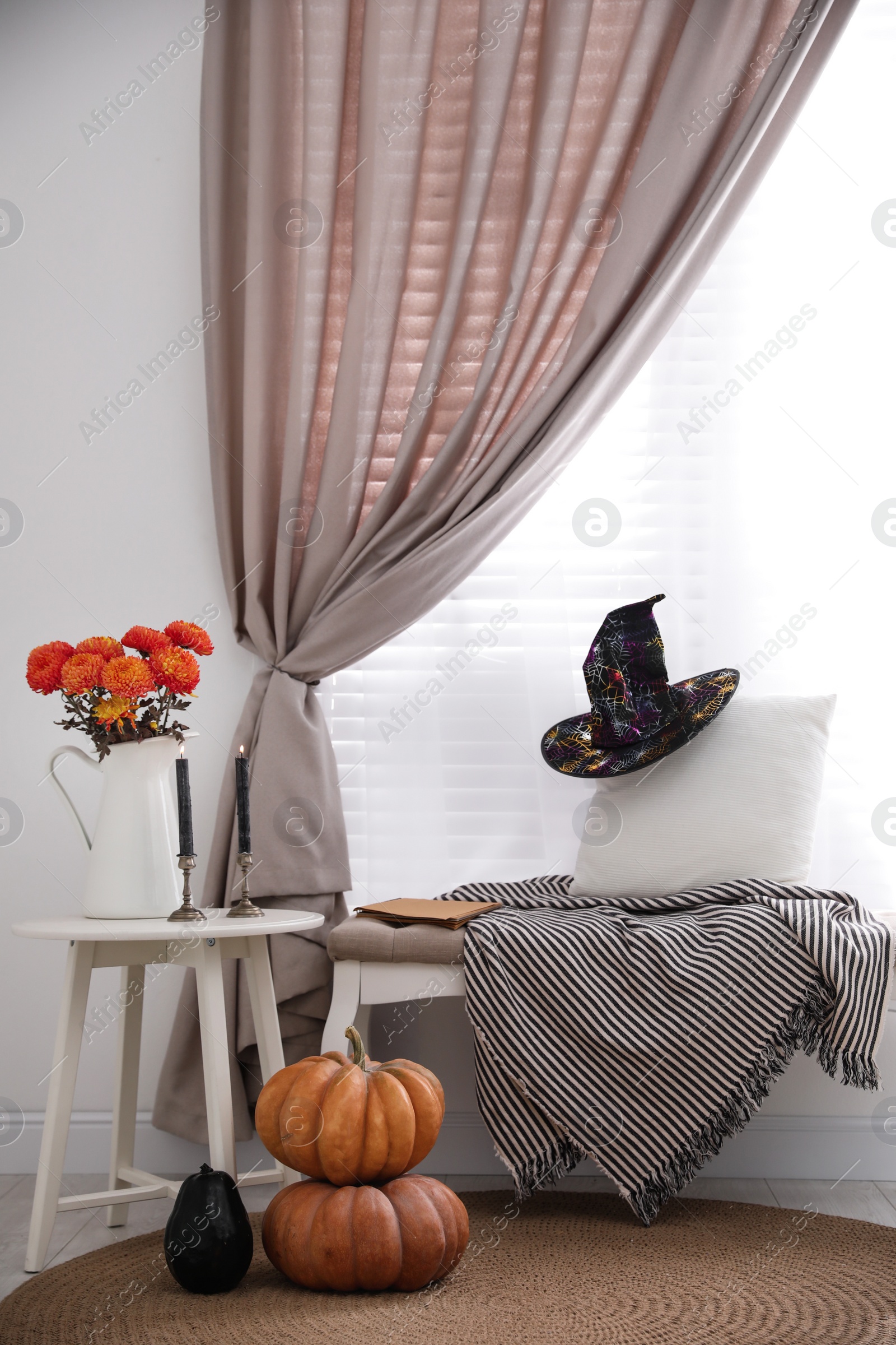 Photo of Modern room decorated for Halloween. Idea for festive interior