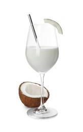 Photo of Glass of delicious coconut milk and coconut isolated on white