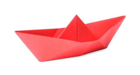 Photo of Red paper boat isolated on white. Origami art