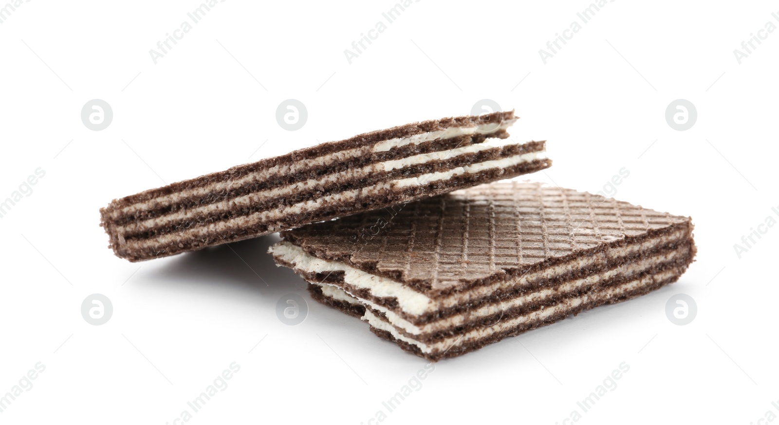 Photo of Halves of chocolate wafer stick isolated on white