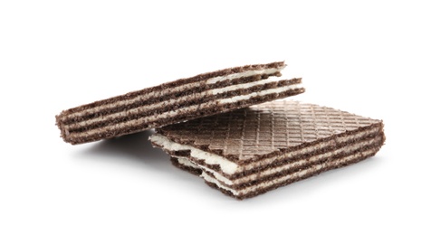 Halves of chocolate wafer stick isolated on white