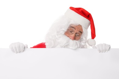 Man in Santa Claus costume posing on white background