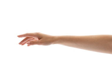 Photo of Young woman holding her hand on white background, closeup