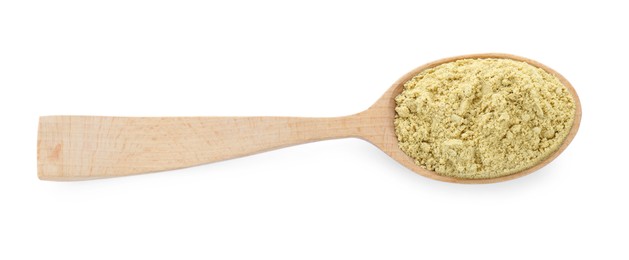 Photo of Wooden spoon with aromatic mustard powder on white background, top view