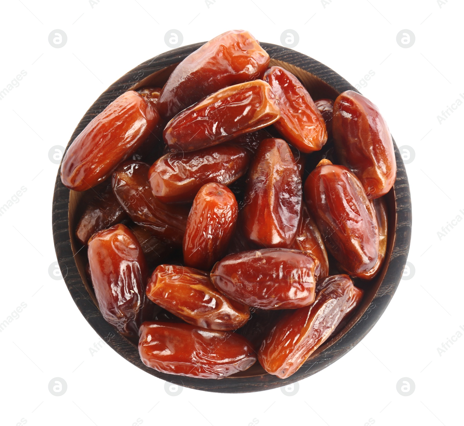 Photo of Tasty sweet dried dates in wooden bowl on white background, top view