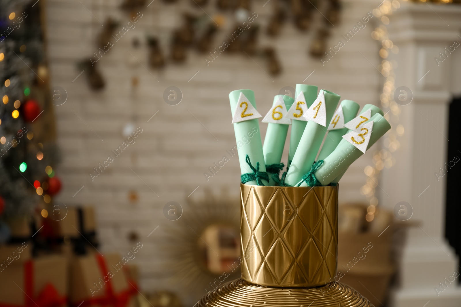 Photo of Christmas advent calendar with gifts in room