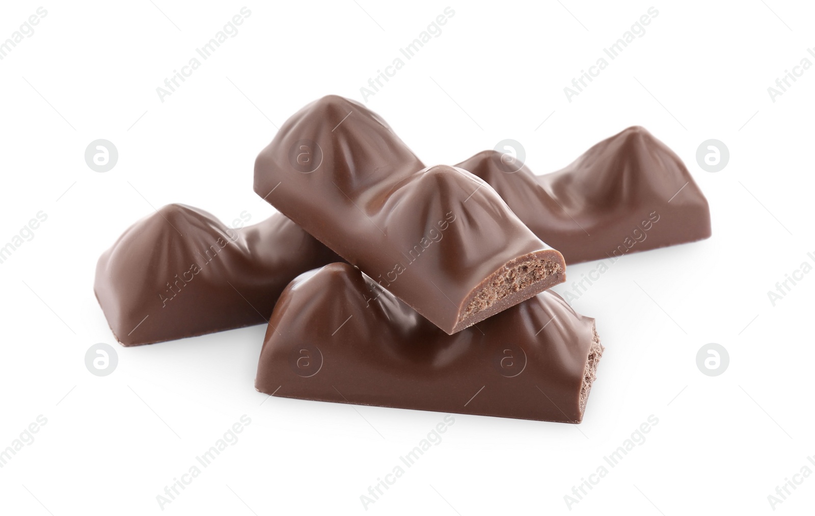 Photo of Pieces of tasty chocolate bars on white background