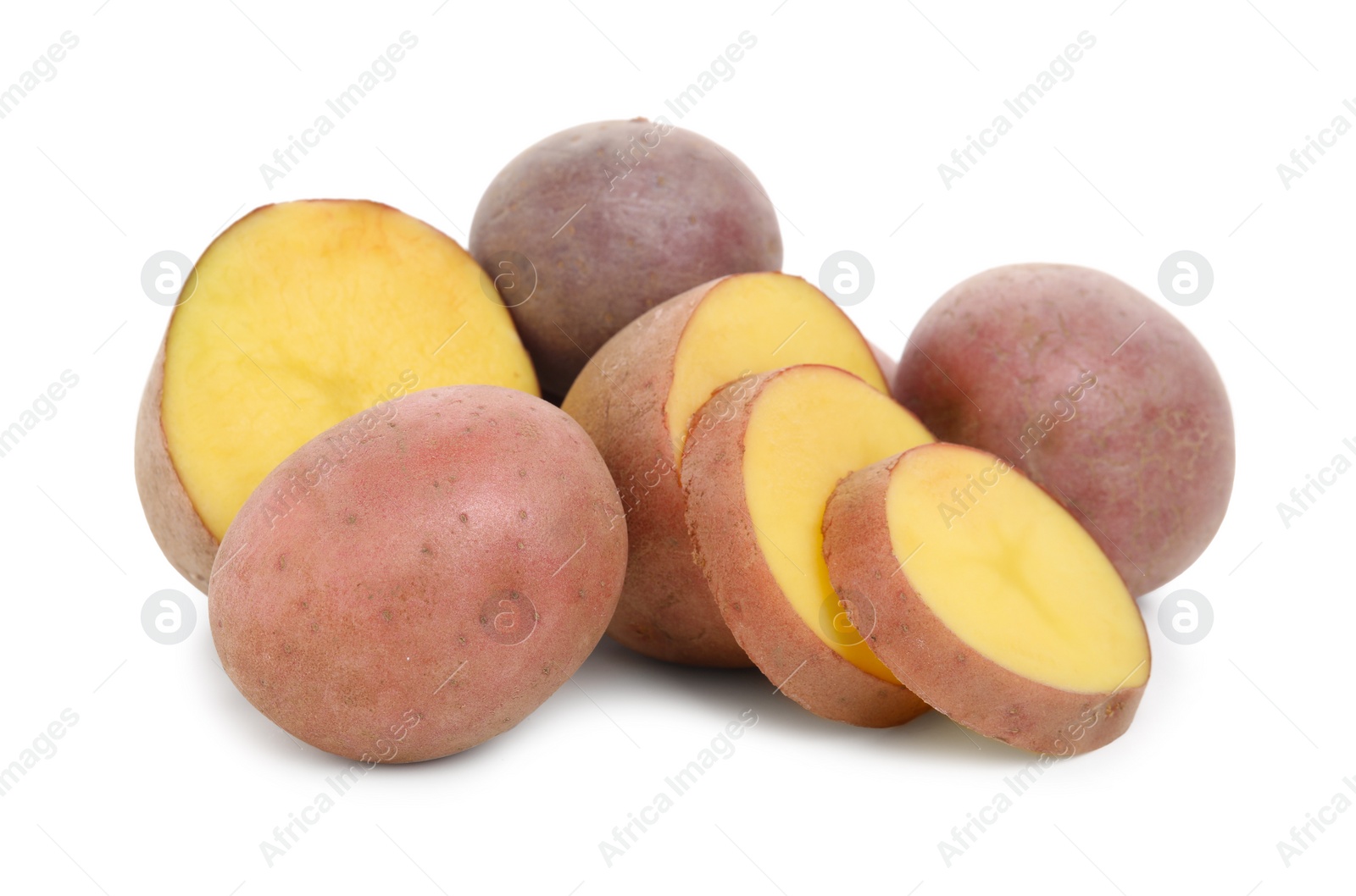 Photo of Whole and cut fresh potatoes on white background